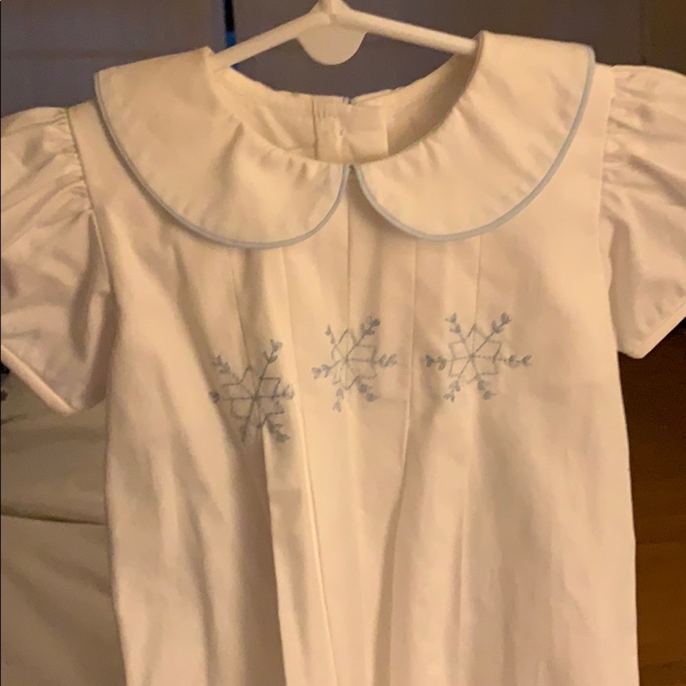 White dress with light blue snowflake accents